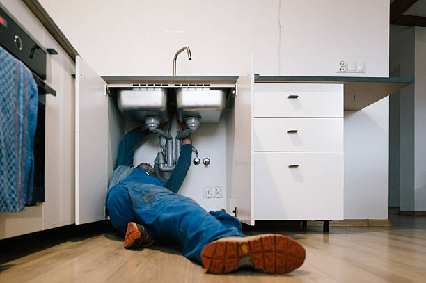 Professional Emergency Plumber technician working in Glen Mills, PA